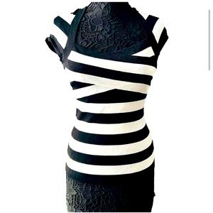 EUC WHBM beautiful black/white stripped fitted bodycon cap sleeve top.